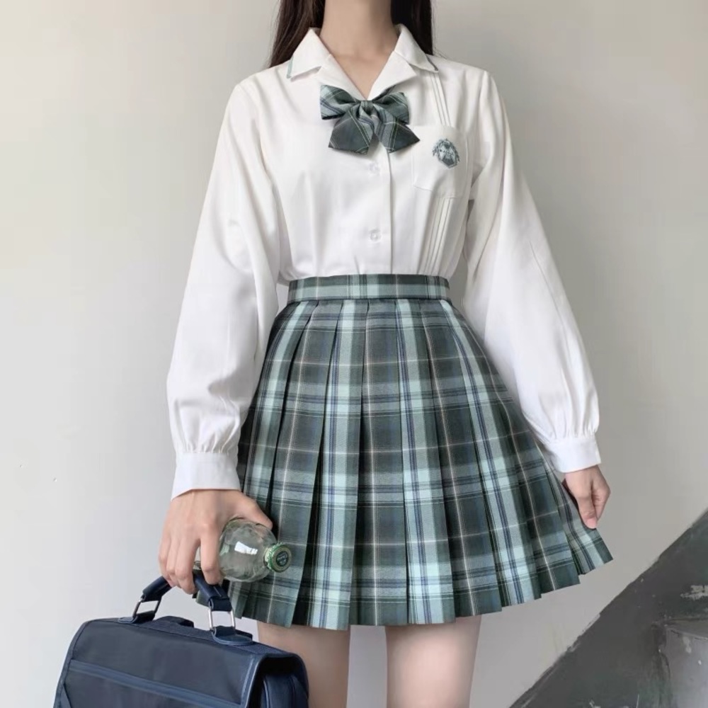 checked pleated skirt with the same grid bow tie